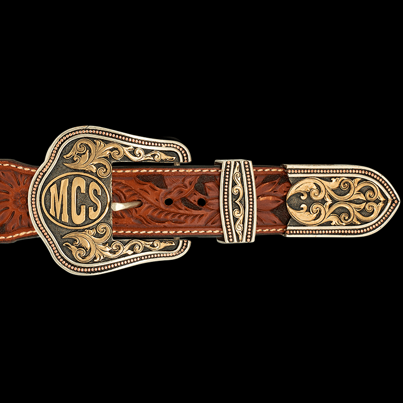 A custom three piece belt buckle set 