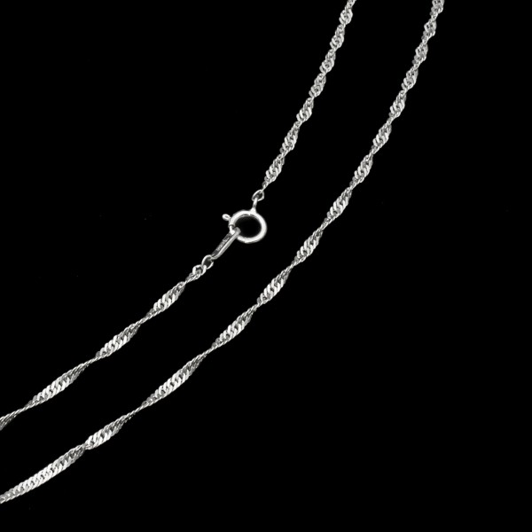 Elevate your style with our Twist Silver Chain, a stunning chain crafted from genuine sterling silver. Perfect for both men and women, this silver chain adds a touch of sophistication to any necklace. Order now!