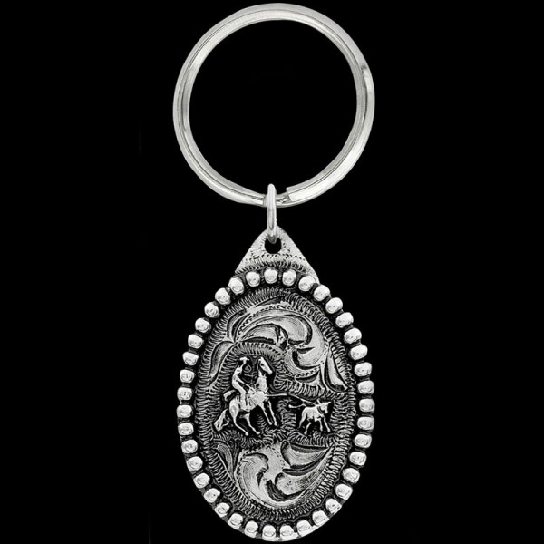 Calf Roping 2 Keychain, Calf Ropin’ is one of our favorite rodeo events! This keychain includes a beaded border, a 3D calf roping figure, and a key ring attachment. Each sil