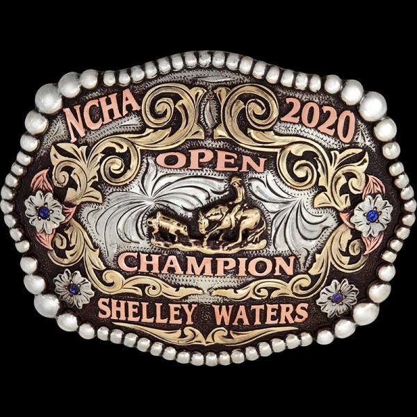 Bullhead, Our very popular Bullhead buckle has a natural German Silver base with brown antique, hand engraving and graduated bead edge.  A true western standard