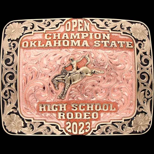 The Decatur Rodeo Belt Buckle is a custom belt buckle built in a Copper Base with an overlapping vine Jeweler's Bronze edge. Personalize this beautiful trophy buckle today!