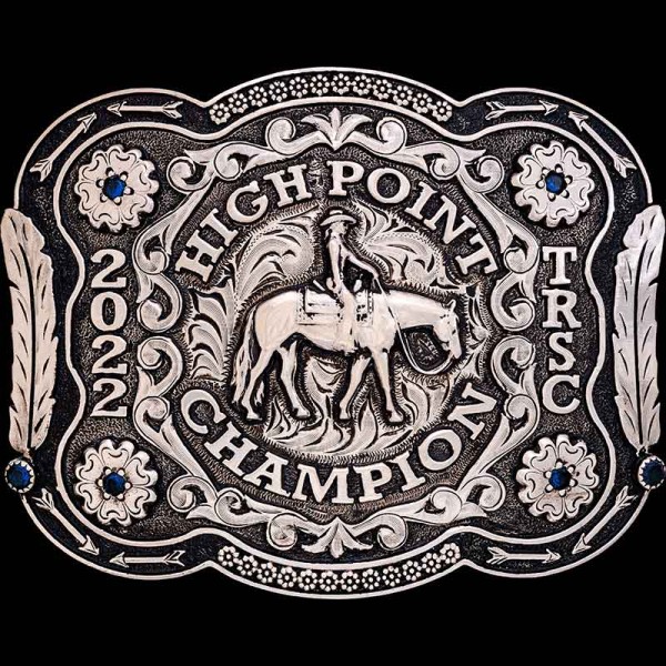 The Corpus Christi Custom Belt Buckle is an entirely German Silver buckle with an antiqued finish and border feathers. Personalize this silver buckle with your own western or rodeo figure!