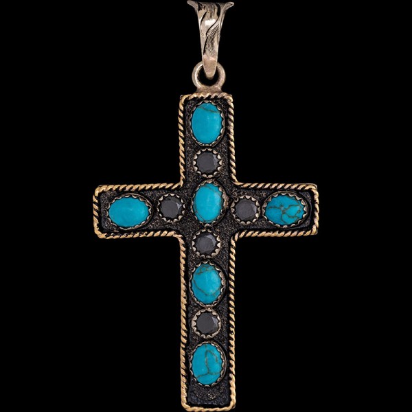 James, Beautiful German Silver cross 1.6"x2.3" with a Jewelers Bronze rope edge and simulated turquoise and cubic zirconias.