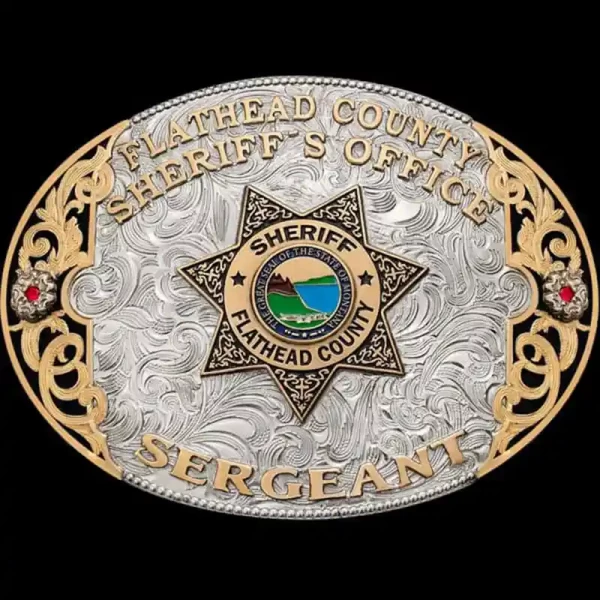 Customize the Bigfork Belt Buckle for any law enforcement organization! This oval-shaped custom buckle is crafted on a hand engraved base with bronze scrollwork. Personalize it today for your organization!