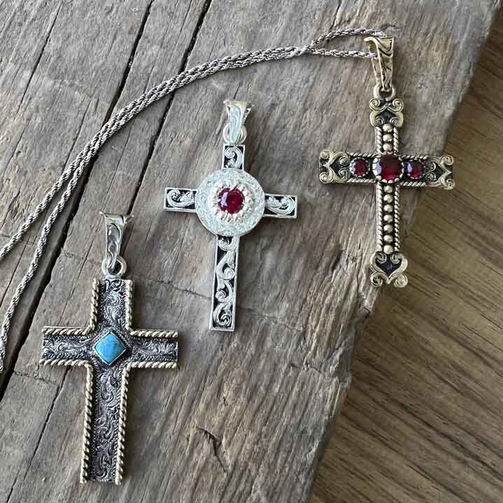 A set of cross necklaces with turquoise and simulated rubys